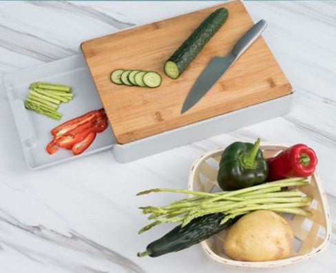 Kitchen cutting board with storage drawer