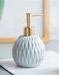 Liquid soap dispenser light blue and gold