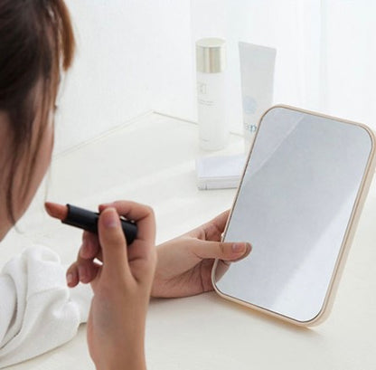 Folding makeup mirror