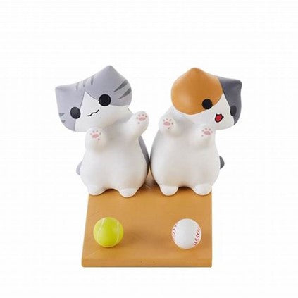 Cute cat cellphone stand or multifunctional gadget on desk